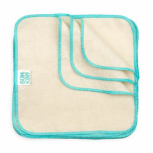 natural cloth in square shape with aqua coloured stitching