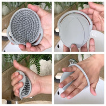 four different views of the brush, showing the small silicone spikes, the small oval shape, super soft and flexible and small hand to hold onto your hand