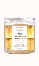 packaging for mammas milk bar white chocolate, a clear container with a silver screw lid and large label