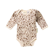 cream with brown birds, ferns, trees, mountains all over it