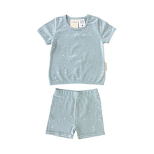 solid muted grey blue with small white stars all over in t-shirt and shorts pyjama set