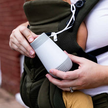 attached to a baby carrier showing its portabe